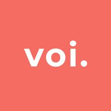 A photo of the red logo of Voi Technologies, which is a company that use the Mutonic IT-procurement platform to purchase IT for 80 offices in 11 different countries in Europe.